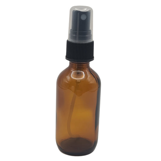 Brown spray bottle with black nozzle on a light gray background